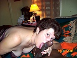 cindi_lickin_her_black_lovers_cock.jpg